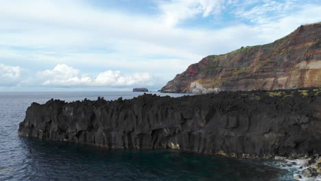 Flying-Above-Volcanic-Rocks-at-Ponta-Da-Ferraria-Shoreline-of-Azores