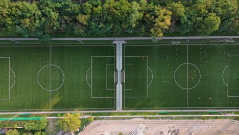 aerial view of two soccer fields with training equipment
