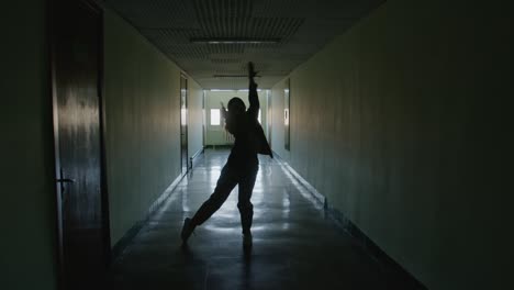 female silhouette dancing contemp in hallway