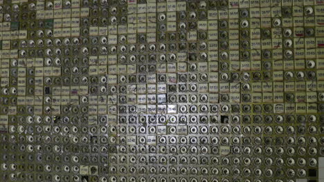 derelict control room of reactor 4 at the chernobyl nuclear power plant in ukraine. zoom in shot