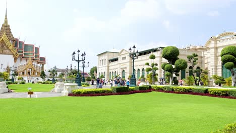 visitors explore the grand palace gardens