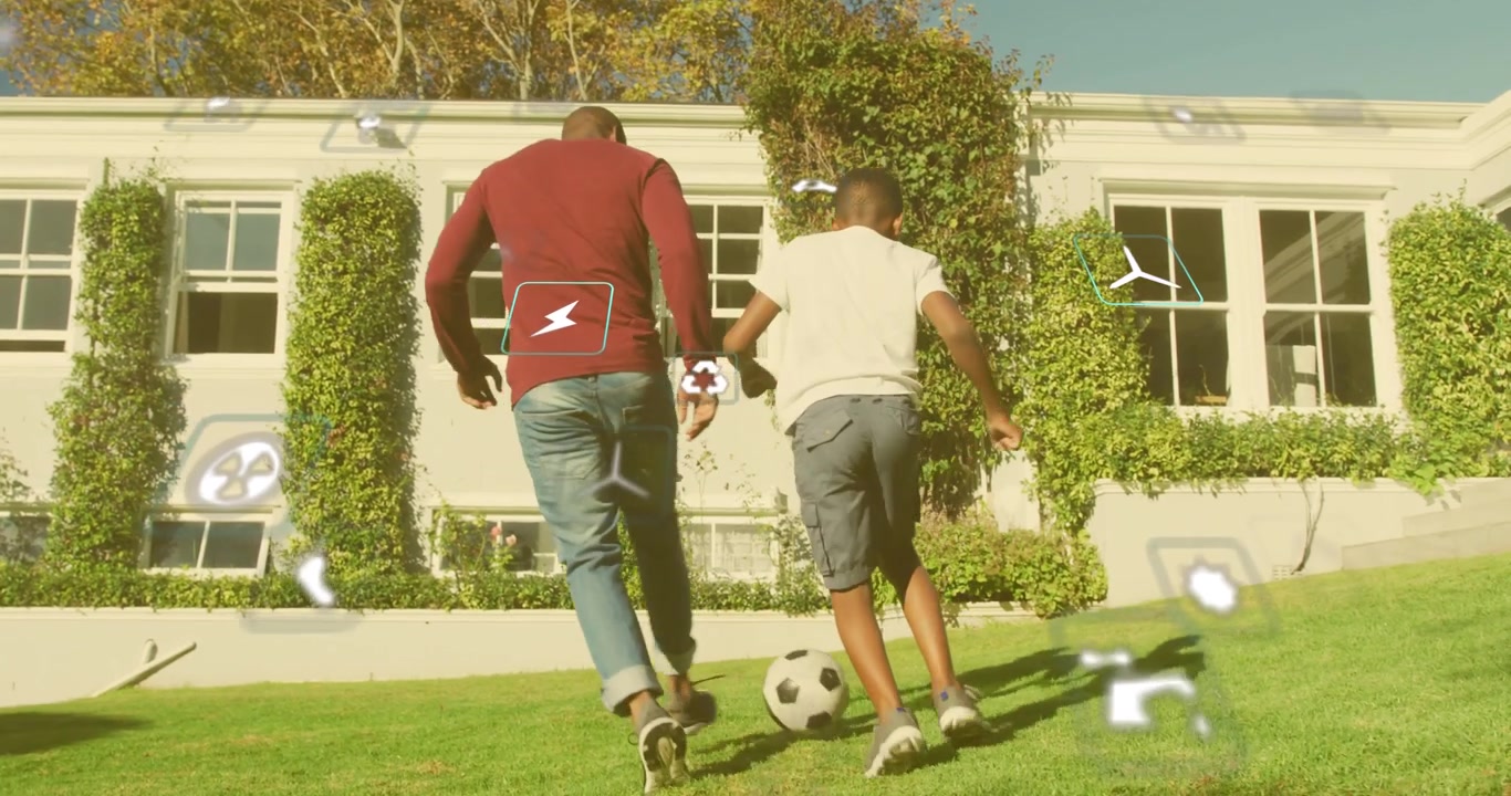 Adult tapping soccer ball, child coming and contesting, playing, dribbling uphill with HUD overlay