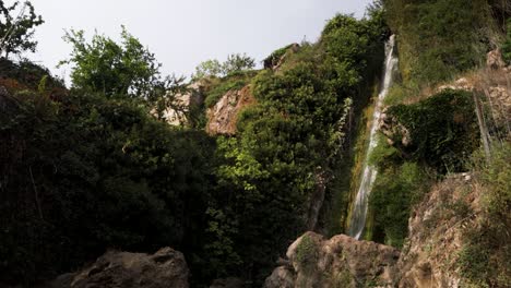 Beauty-of-nature-with-waterfall-in-Spain,-pan-right-view