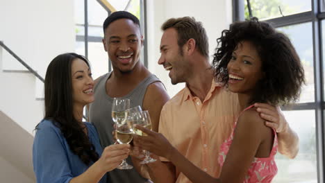 friends cheering with white wine