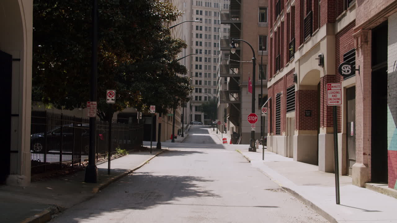Empty City Alleyway with Parking Signs
