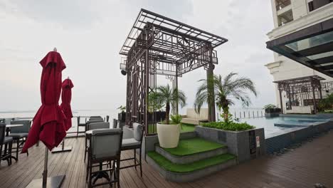 a stunning shot captures a luxurious rooftop terrace, offering breathtaking views, elegant decor, and a serene ambiance under the open sky.
