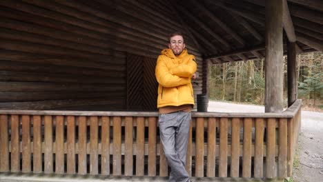 dolly push portrait of a young confident male with bright yellow jacket