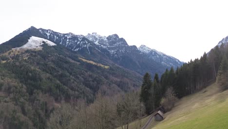 Aerial-view-of-snow-mountain-range-landscape-in-Europe-Austria-4k-winter-drone-footage