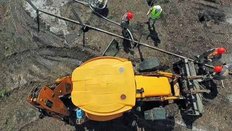 top view of construction site. aerial top down view of machinery working at construction site