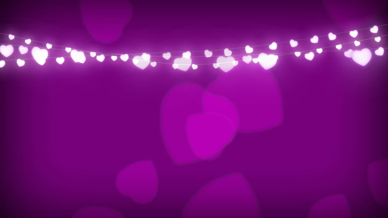 cadena brillante de luces de hadas sobre un fondo rosado