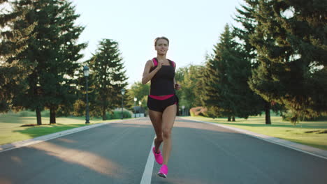 Sport-woman-running-in-park.-Fitness-girl-training-outdoor.-Runner-woman
