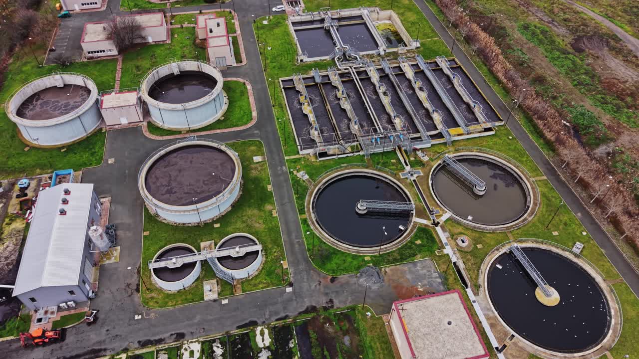 Wastewater treatment plant located in a city environment during daytime