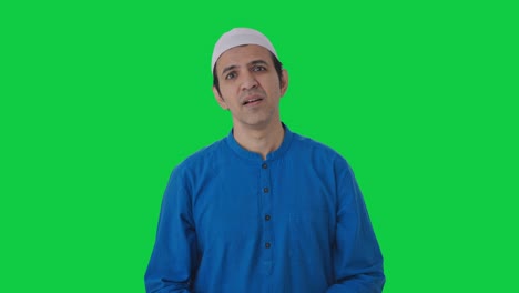 upset muslim man sees something shocking green screen