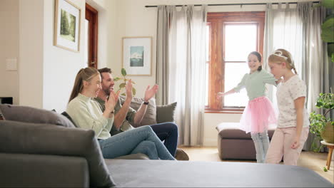 Parents-clapping-for-their-children-in-living-room