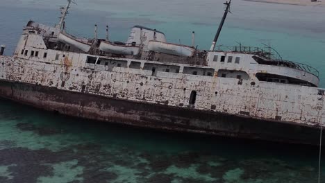 rusty ship stranded on coast of jeddah, saudi arabia