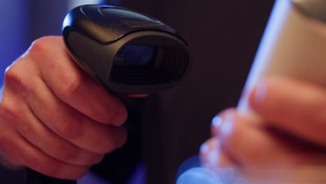 scanning a barcode with a handheld scanner