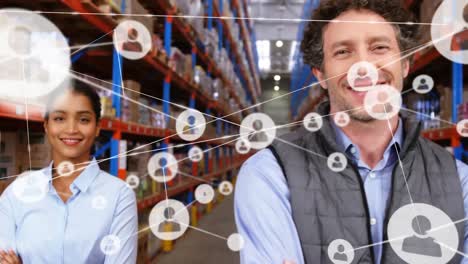 Animation-of-network-of-profile-icons-over-team-of-diverse-supervisors-smiling-at-warehouse