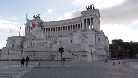 Walking in front of Victor Emmanuel II National Monument located in Rome, capital of Italy. Streets are empty of tourist due to Covid 19 crisis. truck motion.