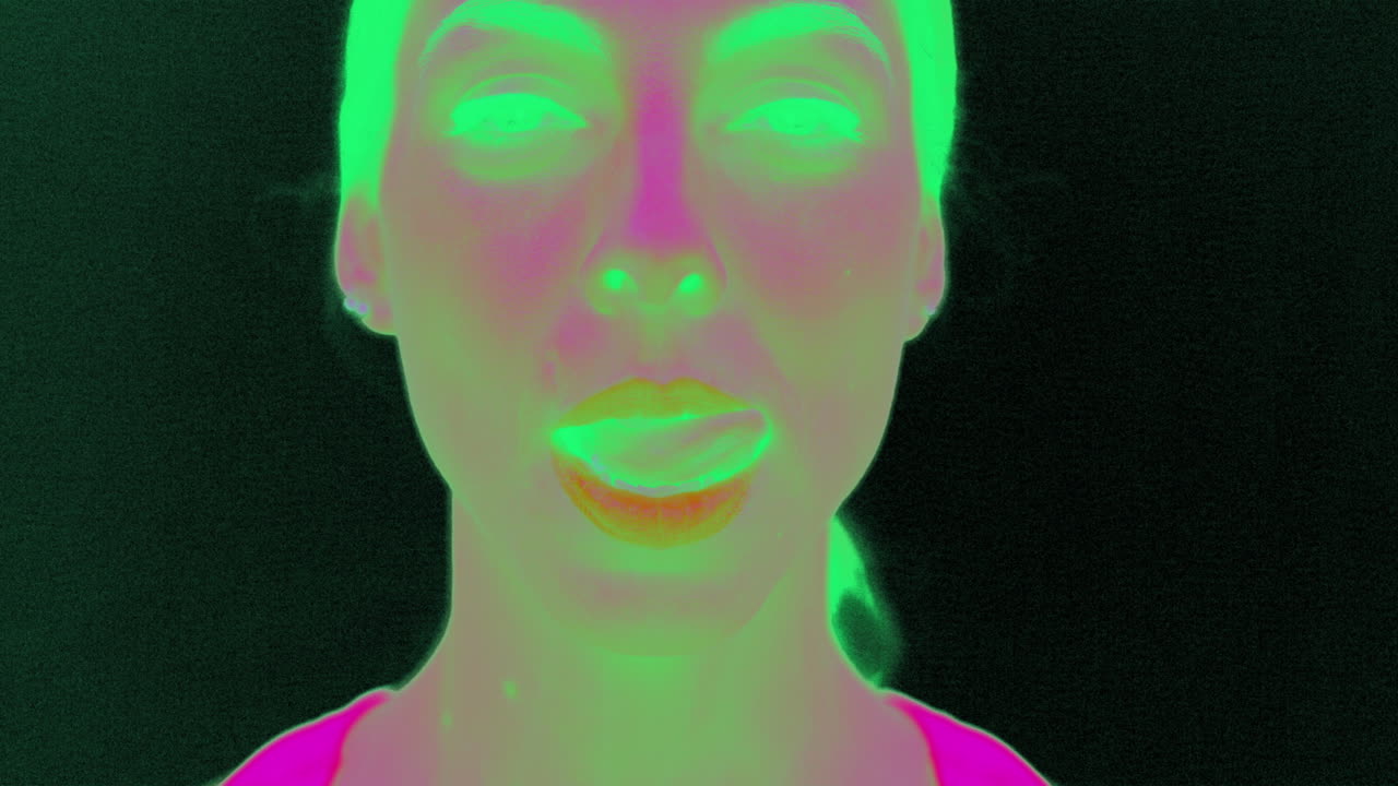 Tempting Woman Licking Her Lips In IR Infrared Camera Slow Motion