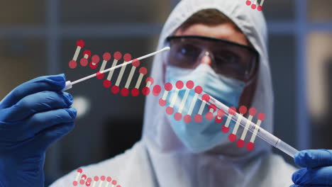 holding swab and test tube, scientist examining dna strand in laboratory