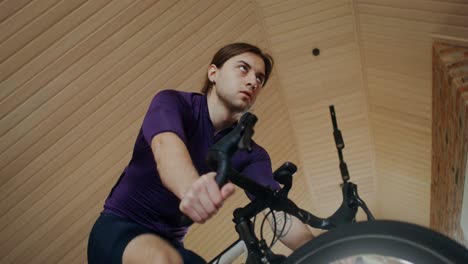 man working out on a stationary bike