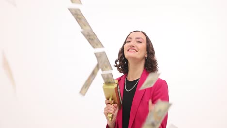 happy woman shooting dollar bills from a money gun