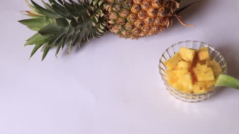 a whole pineapple against a white background