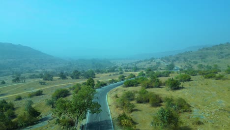 Aerial-view-sctty-Driving-on-Road