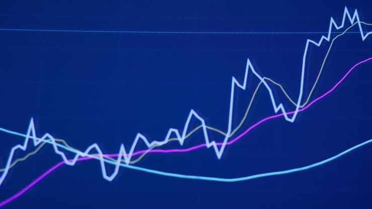 Bakgrunn med valuta- og aksjegraf.