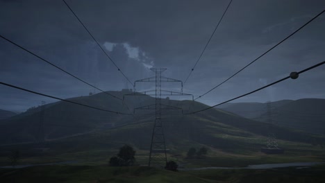 líneas eléctricas sobre el paisaje montañoso por la noche
