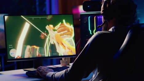 player in coop fps videogame battling flying robots with his online friends