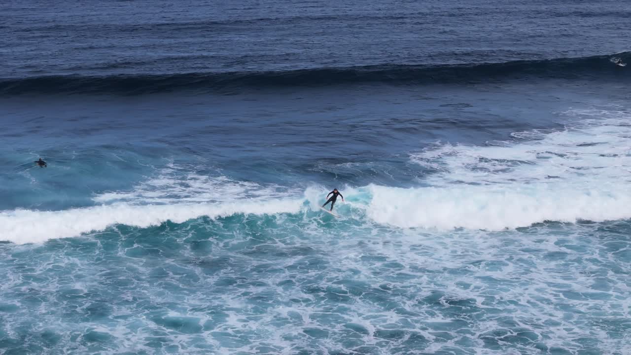 Surfer in Yallingup Margaret River catching a wave
