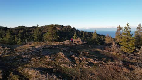 Male-Hiker-on-the-Summit-on-Vancouver-Island,-Canada,-Lone-Tree-Hill