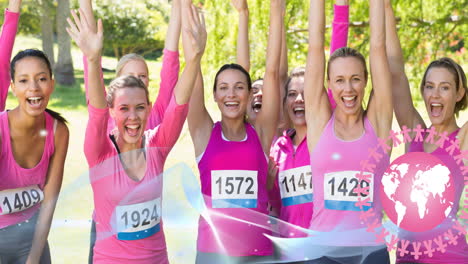 animation of pink globe logo and blue wave over diverse group of smiling women