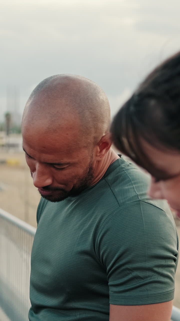 Bald Man Stretching Neck During Outdoor Workout