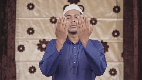 Muslim-man-reading-Holy-Namaz-and-praying-to-God