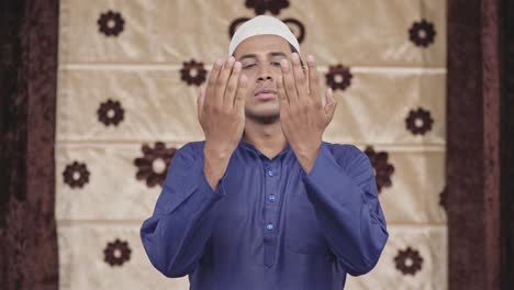 muslim man reading holy namaz and praying to god