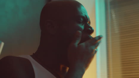 african american man praying before sleeping