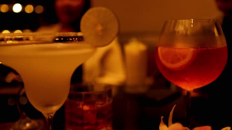 colorful cocktails in a dimly lit bar