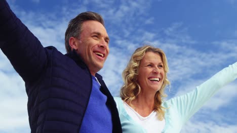 mature couple enjoying on beach