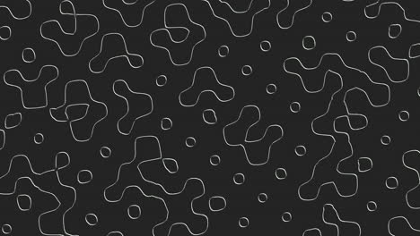 a monochromatic intricate design featuring interconnected circles and scattered dots on a black backdrop, creating a seamless and mesmerizing pattern