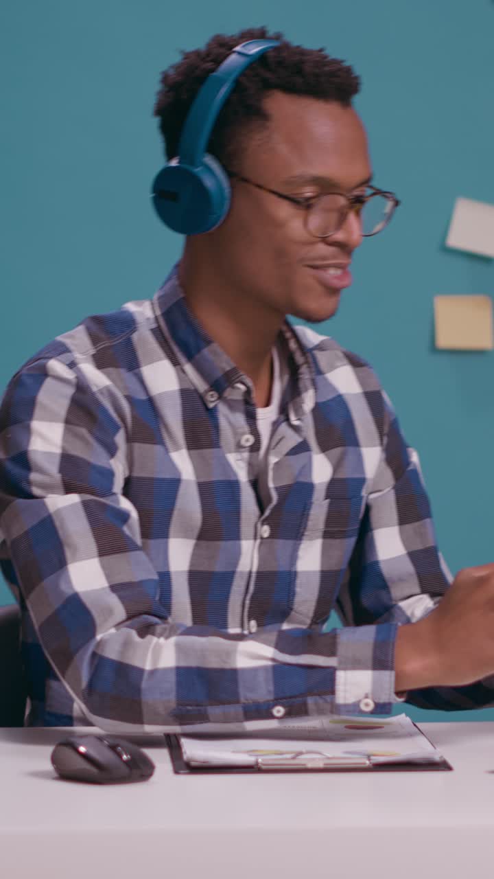 Man playing games during office work