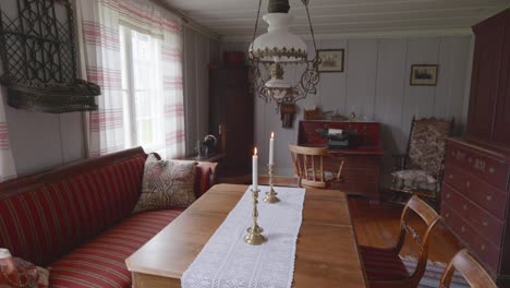 tilt shot of charm of traditional scandinavian design with pan shot of an old-fashioned livingroom