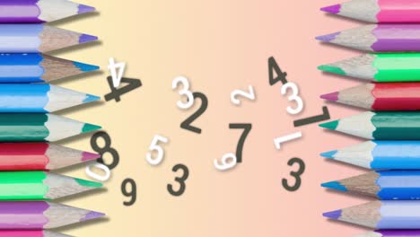 Colored-pencils-against-multiple-changing-numbers-and-alphabets-on-pink-background