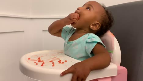 baby eating watermelon for snack
