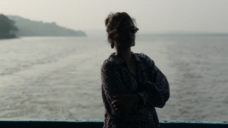 Silhouette-of-Unrecognizable-Young-Woman-Sailing-on-Indian-River