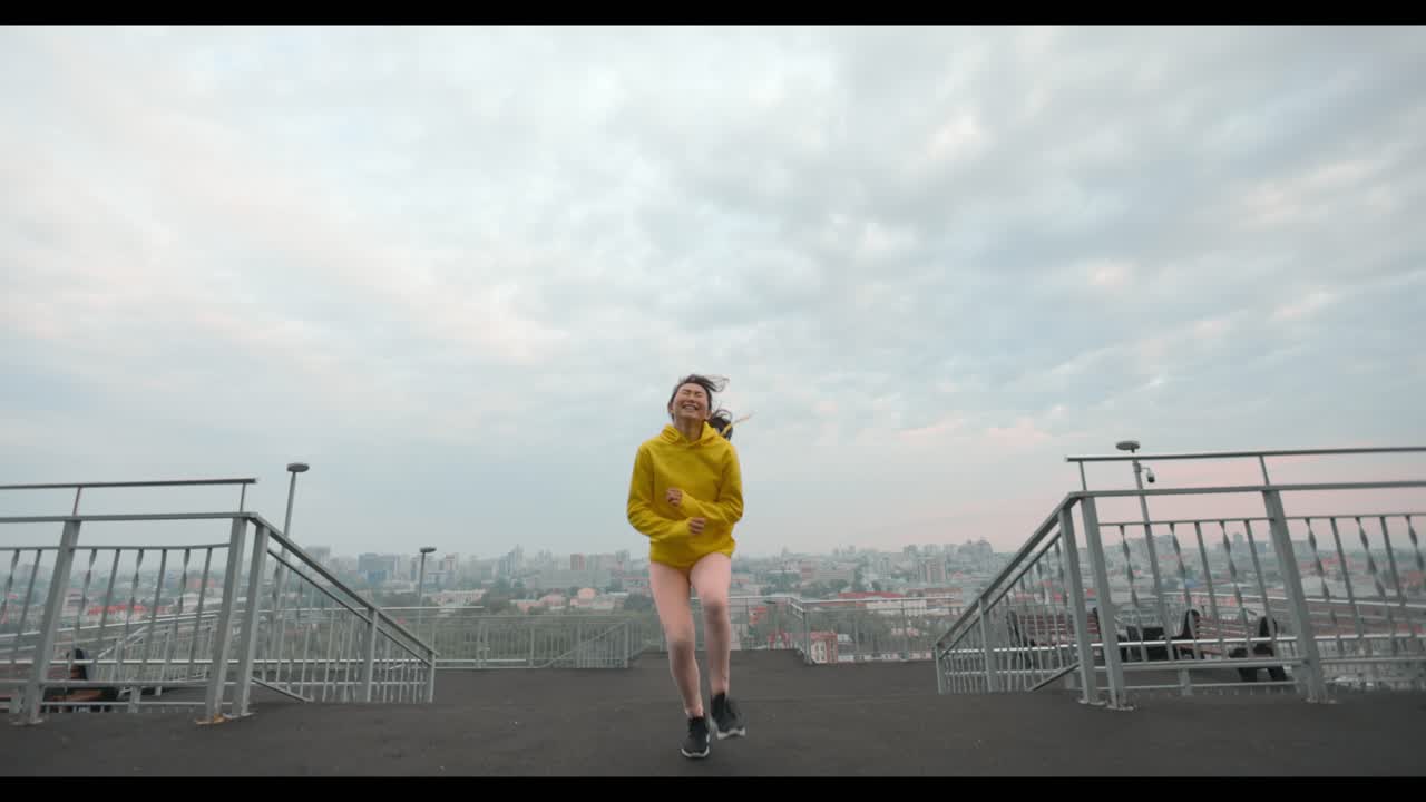 Woman Running Up Stairs in City