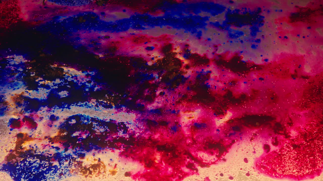 Colourful, organic, liquids macro shots buzzing and flowing