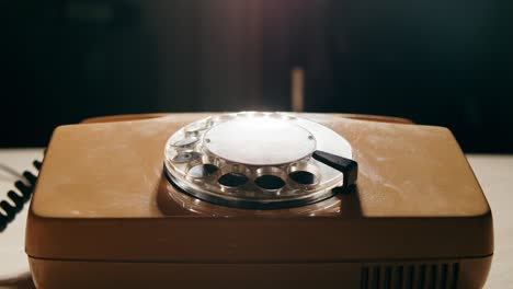 retro vintage phone, a yellow rotary telephone is displayed on a wooden desk, adding a nostalgic touch