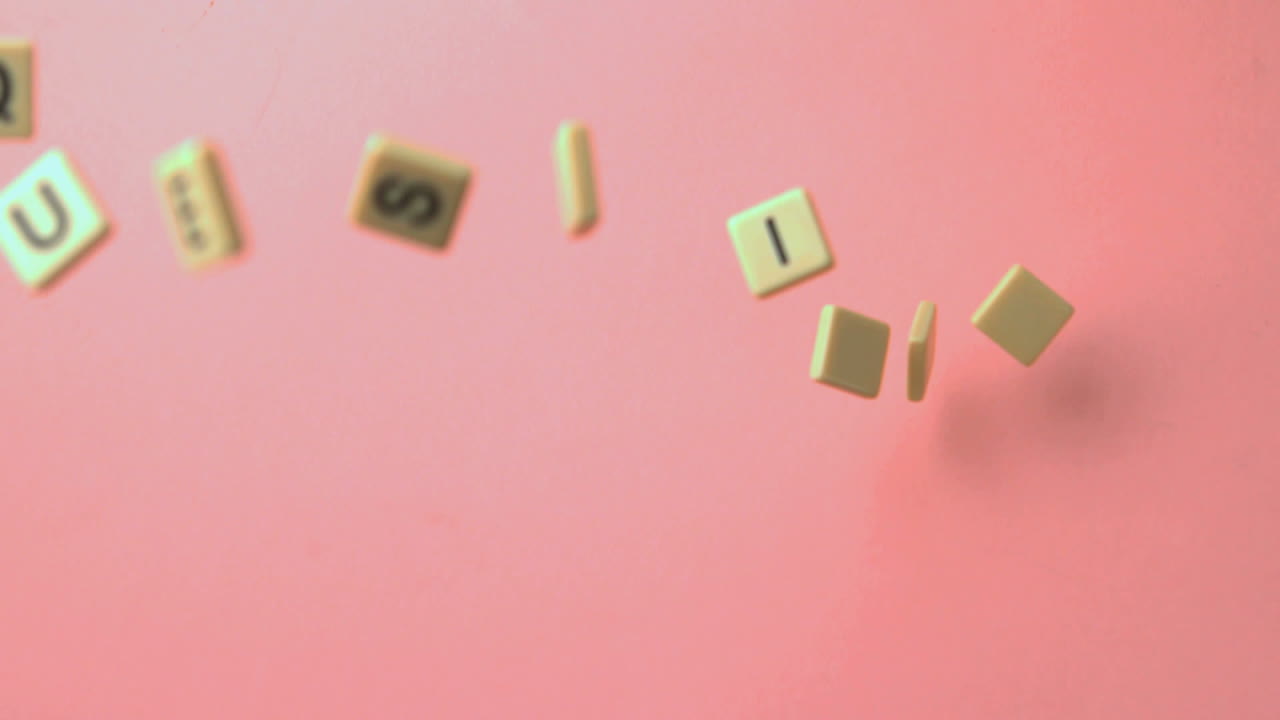 Letter pieces spelling questions coming together